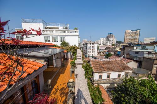 an aerial view of a city with buildings at Lansheng yard in Xiamen