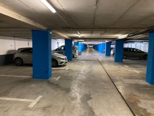 an empty parking garage with cars parked in it at P&C Ribasol in Arinsal