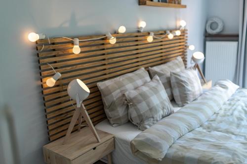 Apartament "Zacisze" z tarasemにあるベッド