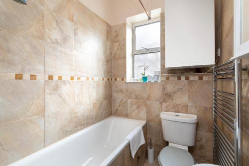 Et badeværelse på homely - Central London King’s Cross Apartments