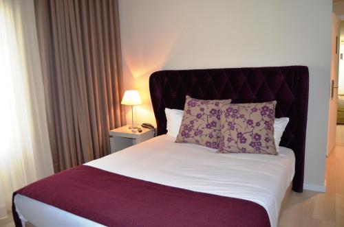Hotel Torres Novasにあるベッド