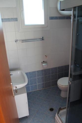 Ett badrum på Apartment Luci