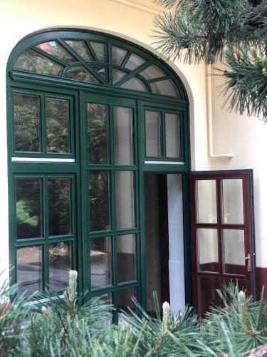 an arched window on a house at Aqua Villa Eger in Eger