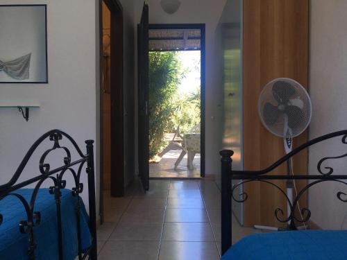 Postel nebo postele na pokoji v ubytování Garden Rooms