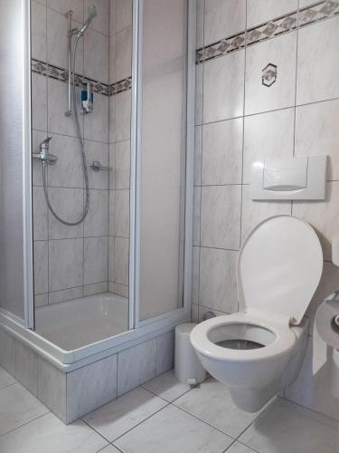 Ванная комната в Hotel Olympica