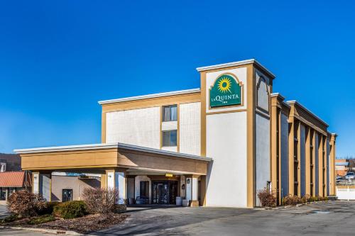 a building with a sign on the front of it at La Quinta Inn by Wyndham Binghamton - Johnson City in Johnson City