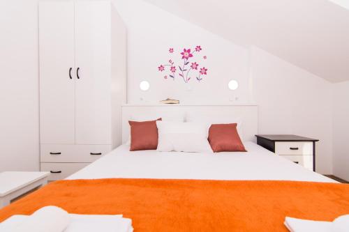 Postel nebo postele na pokoji v ubytování Apartman Mišura