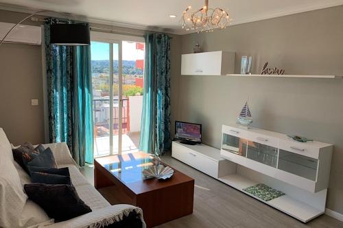 Et tv og/eller underholdning på Charming apartment with sea views, Playa Arenal, Javea