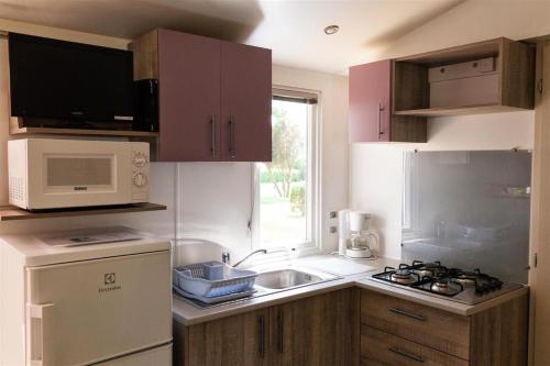 Dapur atau dapur kecil di Résidence Santa