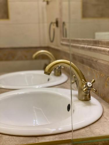 Ванная комната в Exclusive Apartmanok Szeged