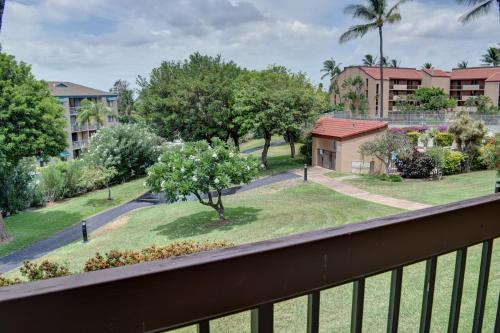 a balcony with a view of a park at Maui Vista 3205 in Kihei