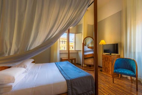 Postel nebo postele na pokoji v ubytování Best Western Hotel Artdeco