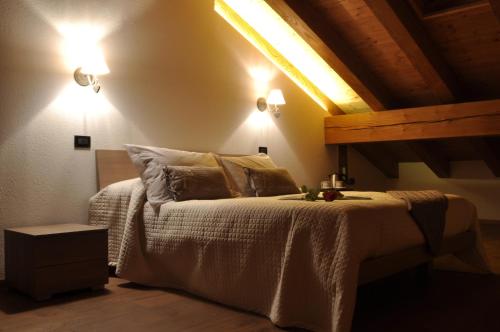 Postel nebo postele na pokoji v ubytování Maison Constance