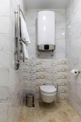 Ванная комната в barasport city apartments