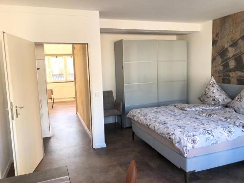 Ένα ή περισσότερα κρεβάτια σε δωμάτιο στο Haus Pia Executive Apartments