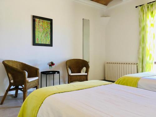 Llit o llits en una habitació de Villa Imperial