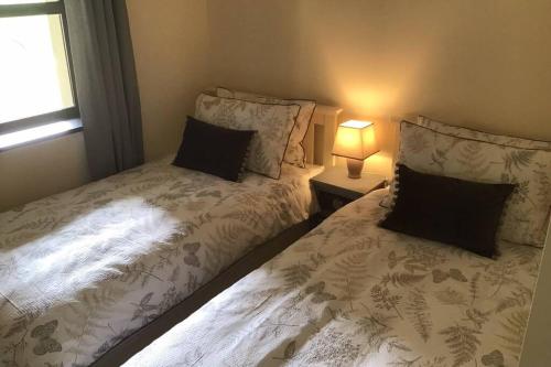Llit o llits en una habitació de Waterfront apartment completely refurbished