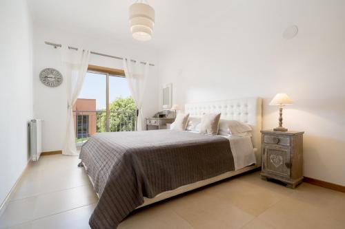 
A bed or beds in a room at Villa Ofelia 46 by Destination Algarve
