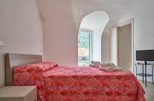 Posteľ alebo postele v izbe v ubytovaní Maiori Dream House 1