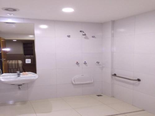 Ein Badezimmer in der Unterkunft Hotel Rede 1