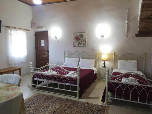 Ένα ή περισσότερα κρεβάτια σε δωμάτιο στο Clio apartments