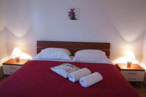 Una cama o camas en una habitación de Verita