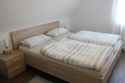 Ferienhaus Storchennest tesisinde bir odada yatak veya yataklar