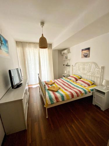 Postel nebo postele na pokoji v ubytování Scoica Alba Mamaia Nord Summerland