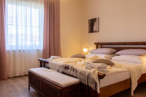 Postel nebo postele na pokoji v ubytování Villa Anzio
