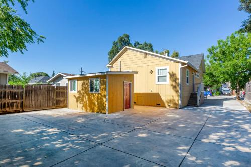 a house with a driveway and a fence at @ Marbella Lane Mini Guest House in Downtown San Jose in San Jose