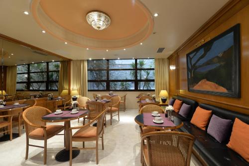 Χώρος καθιστικού στο Victory Inn Hotel