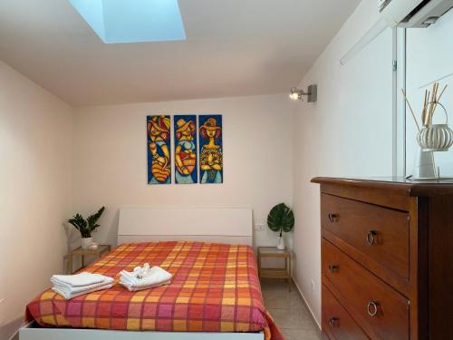 Postel nebo postele na pokoji v ubytování Casa Renato