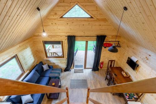an overhead view of a living room in a tiny house at Domki w sadzie in Wydminy