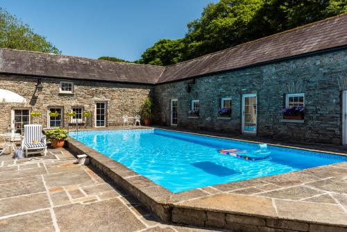 The swimming pool at or close to Ardnavaha House - Poolside Cottages