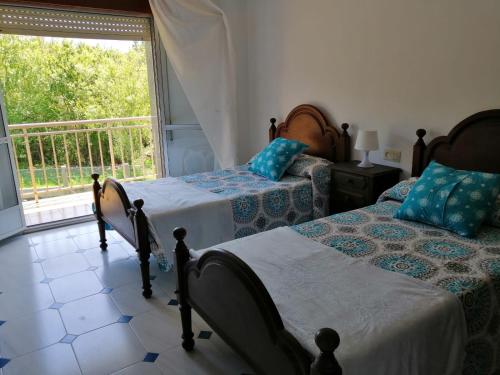 Tempat tidur dalam kamar di Playa Montalvo