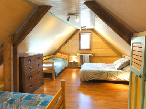 Cama o camas de una habitación en Les Tinons