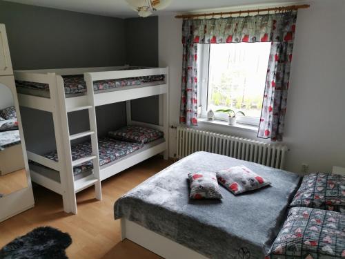 Postel nebo postele na pokoji v ubytování U Waltera