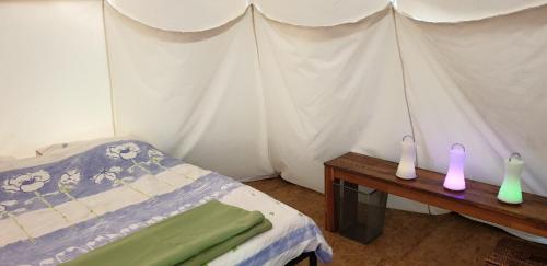 Postel nebo postele na pokoji v ubytování TIPIsche trekkershut - Camping Le Soustran