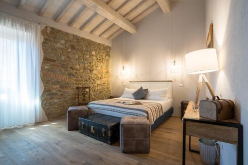 Postel nebo postele na pokoji v ubytování Dimora delle Muse