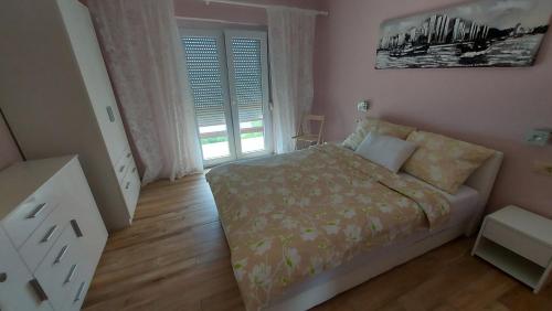 Postel nebo postele na pokoji v ubytování Holiday paradise Opatija
