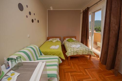 Кровать или кровати в номере Guest Accommodation Slapovi Krke