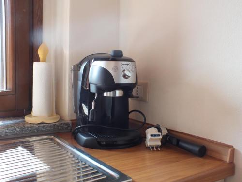 a coffee maker sitting on top of a counter at Relais Cà Nova Guest House in Bogogno