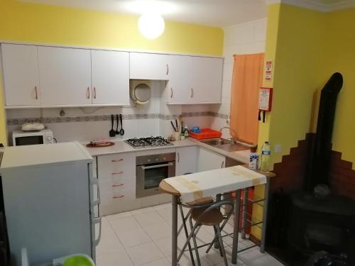Η κουζίνα ή μικρή κουζίνα στο Apartamento KumiKata