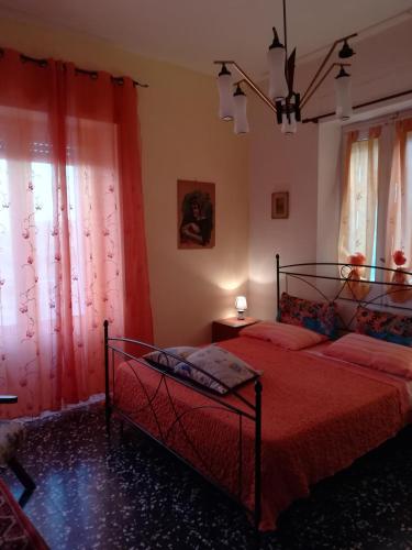 Postel nebo postele na pokoji v ubytování Casamuseo del Risorgimento
