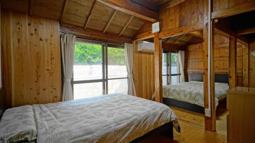 Un pat sau paturi într-o cameră la Mannaya -SEVEN Hotels and Resorts-