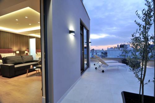 Ruang duduk di Athens Platinum Rooms and Suites
