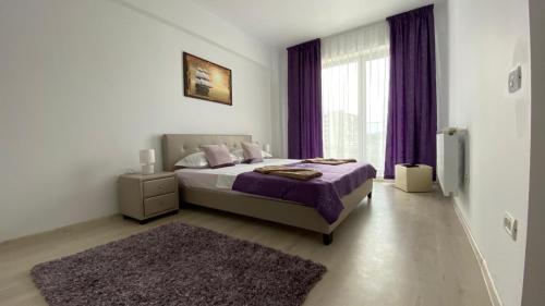 Katil atau katil-katil dalam bilik di Mario Building Apartments