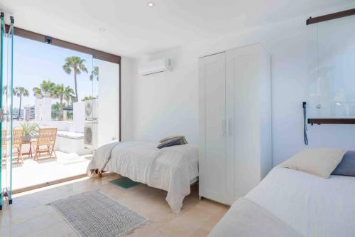 En eller flere senge i et værelse på Town house Puerto Banus/Marbella - 200 m to beach
