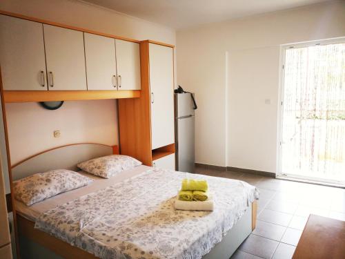 Кровать или кровати в номере Apartments Venci