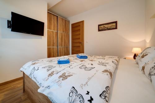 Krevet ili kreveti u jedinici u okviru objekta Avantura apartman
